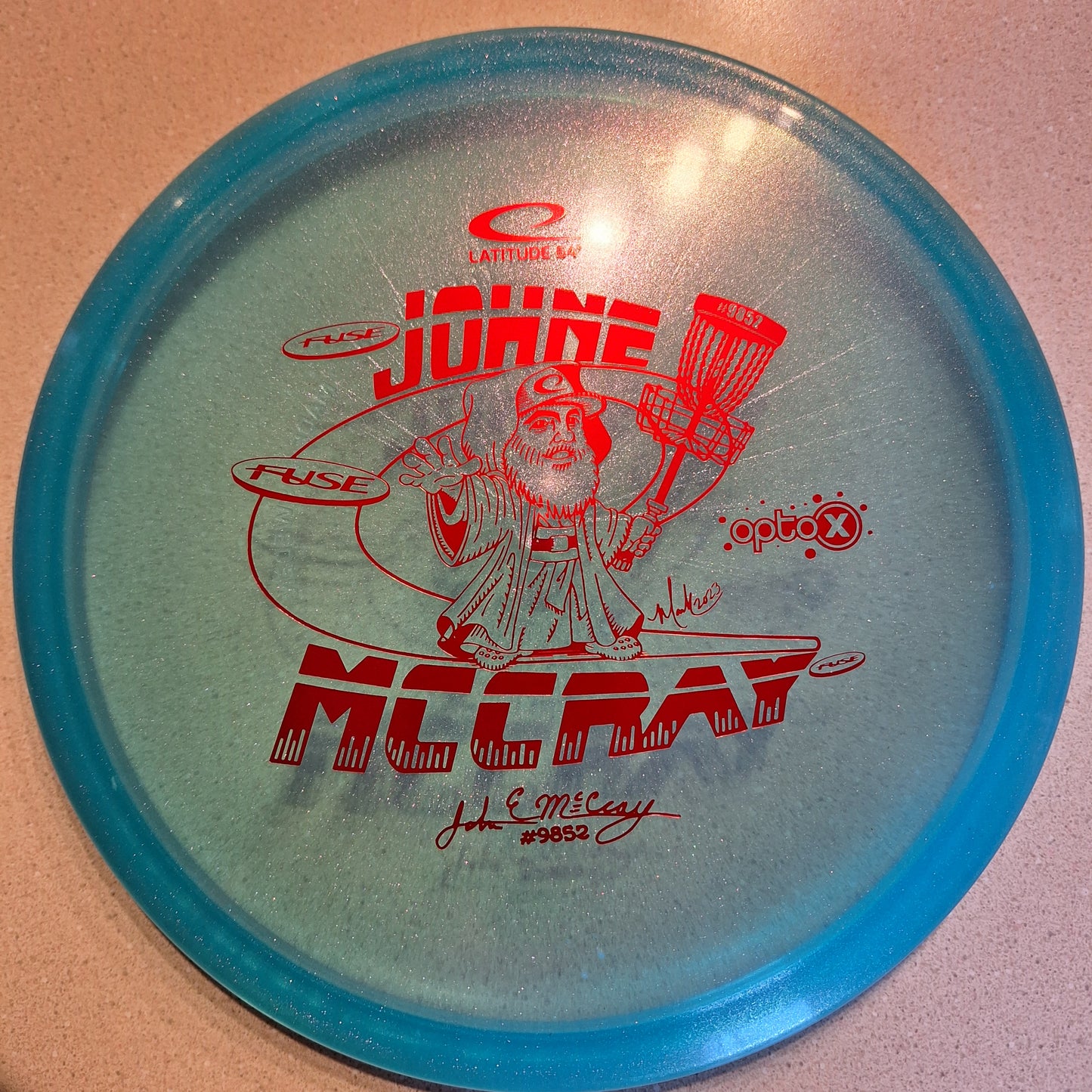 Latitude 64 Opto-X Glimmer Fuse- JohnE McCray 2024 Team Series